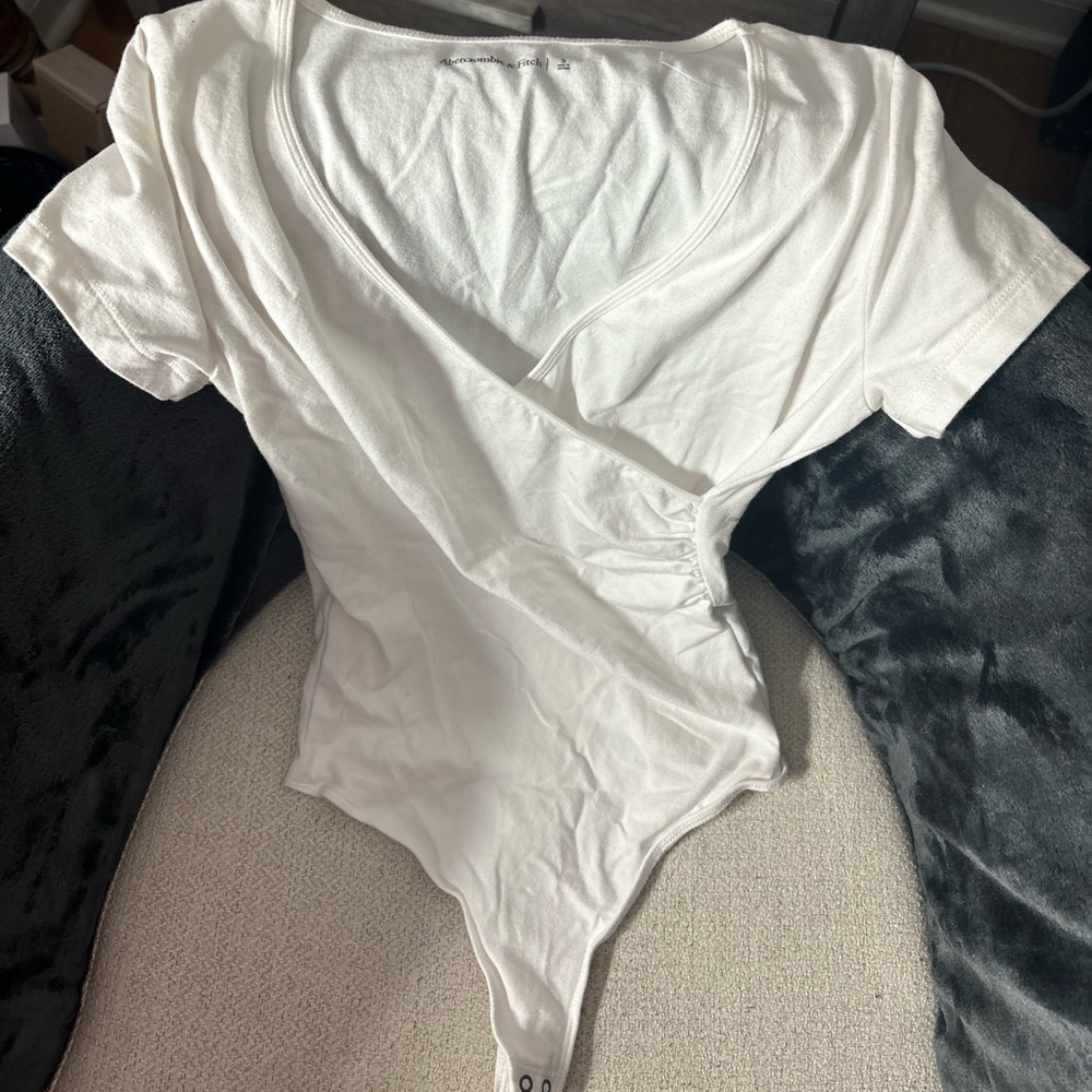 Abercrombie size small white cotton crossover bodysuit.